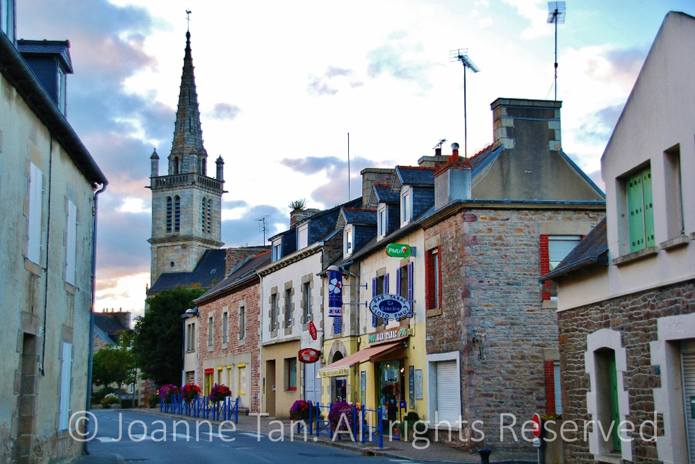 p- architecture - cityscape - a street, stone buildings & a church steeple - Paimpol, Brittany, France
