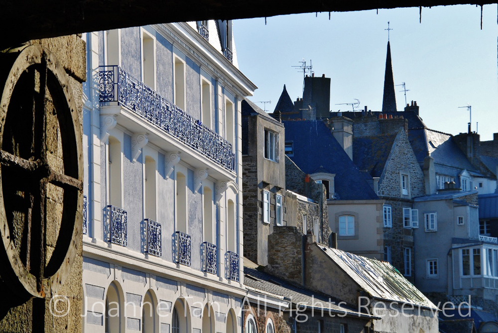 p- architecture - cityscape - street scene - old city gate & stone French buildings - St. Malo, Brittany, France